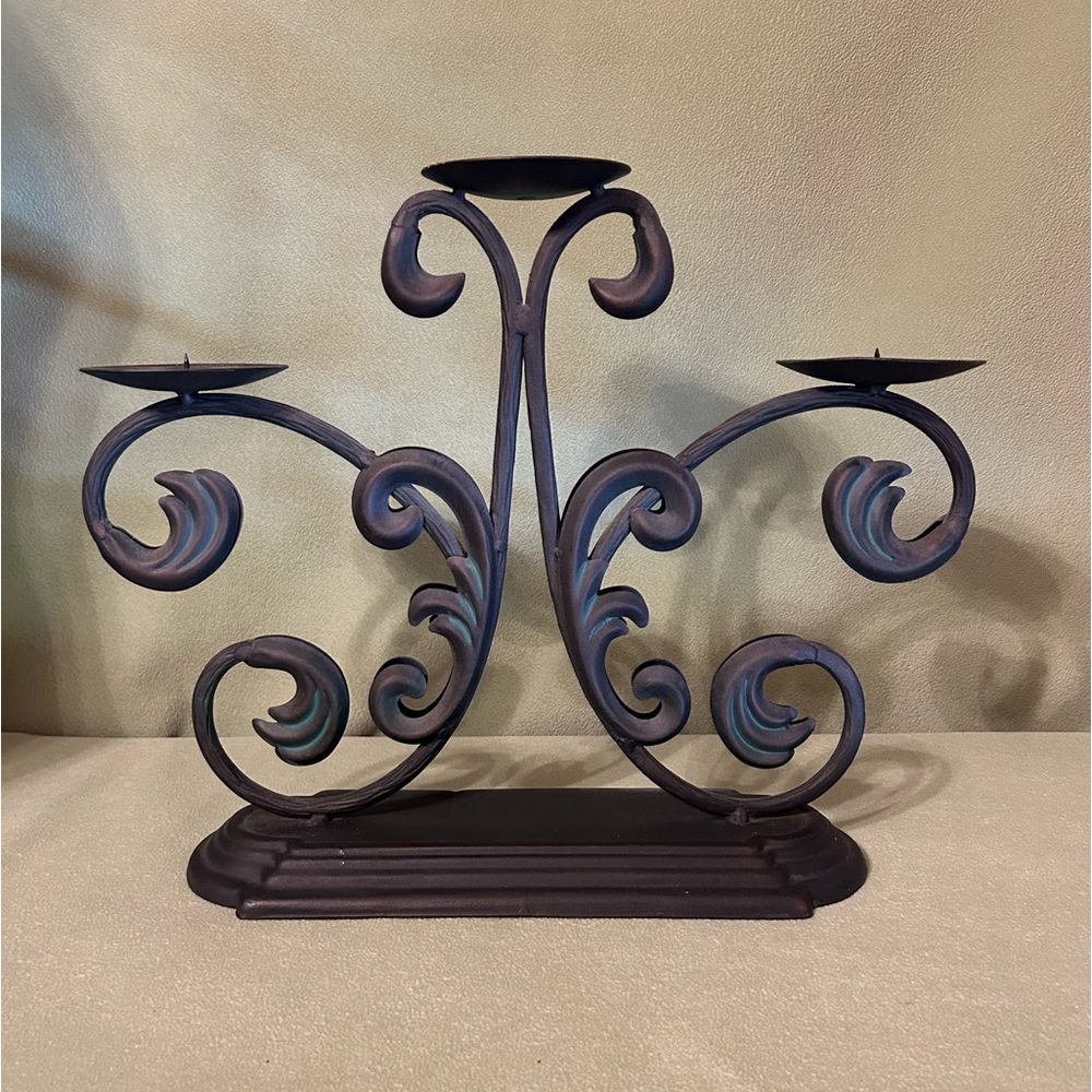 Beautiful metal candle holder.